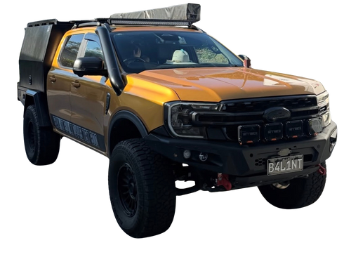 Ford Next-Gen Ranger with light bar and Canna Fabrication stainless snorkel — front three-quarter view