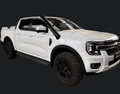 White Ford Next-Gen Ranger with sports bar and Canna Fabrication brushed-silver stainless snorkel — studio side view